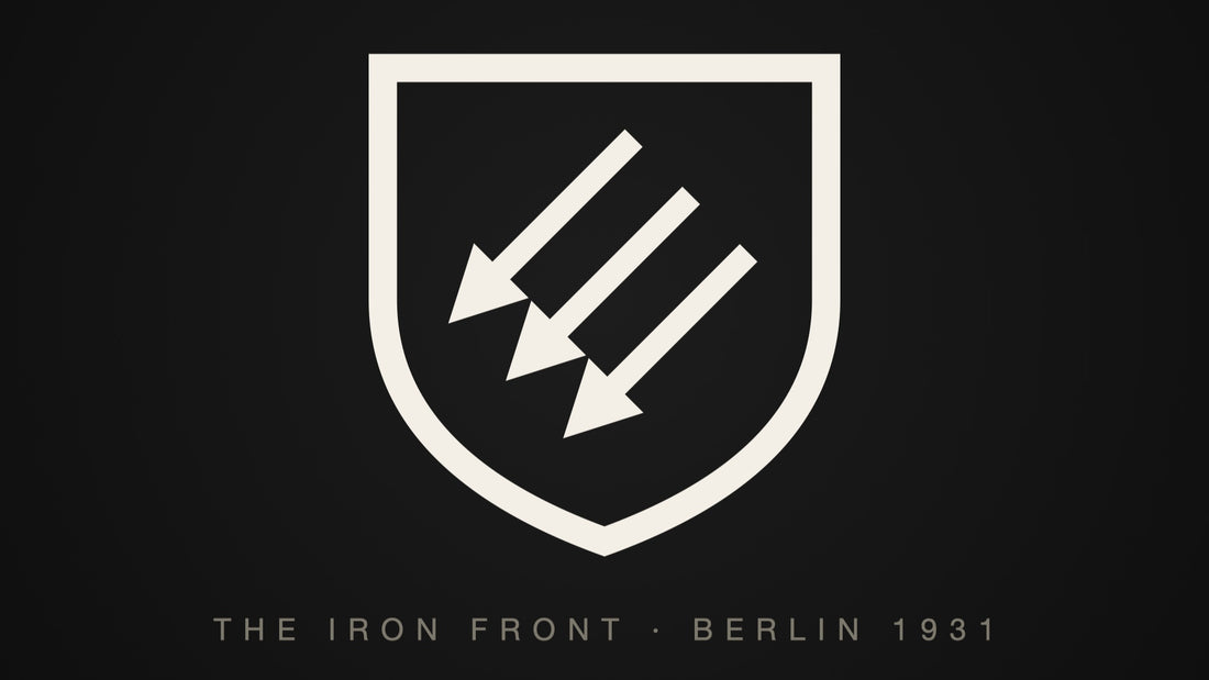 A shield carrying three downward arrows — the Iron Front, the pro-democracy alliance of 1931